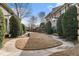 Well-maintained lawn area with mature shrubs and pedestrian sidewalks at 2232 Dunseath Nw Ave # 302, Atlanta, GA 30318