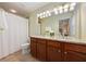 Bathroom featuring double sinks and shower with neutral color palette at 2316 Limehurst Ne Dr, Atlanta, GA 30319