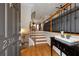 Welcoming entryway featuring hardwood floors, a staircase with wrought iron railing, and natural light at 2316 Limehurst Ne Dr, Atlanta, GA 30319