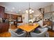 View of the kitchen and dining area, featuring wood cabinets and stainless steel appliances at 2316 Limehurst Ne Dr, Atlanta, GA 30319