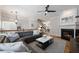 Stylish living room with a fireplace, hardwood floors, and a sectional sofa, perfect for relaxing and entertaining at 2316 Limehurst Ne Dr, Atlanta, GA 30319