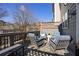 Enjoy outdoor living on this patio with rocking chairs, outdoor rug, and side tables for leisure at 2316 Limehurst Ne Dr, Atlanta, GA 30319