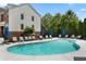 Community pool area with sun loungers and umbrellas for residents' enjoyment on sunny days at 2316 Limehurst Ne Dr, Atlanta, GA 30319
