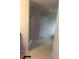 Bathroom with walk-in shower, white door and tile flooring at 114 Crescent Woode Way, Dallas, GA 30157