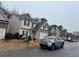 A street view of similar homes highlights the neighborhood at 114 Crescent Woode Way, Dallas, GA 30157