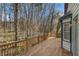 A spacious back deck with a wooded view at 624 Longbow Ct, Stone Mountain, GA 30087