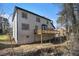 Back exterior view featuring a wooden deck and basement access at 624 Longbow Ct, Stone Mountain, GA 30087