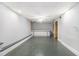 Spacious basement area featuring a bar, neutral walls, and recessed lighting at 624 Longbow Ct, Stone Mountain, GA 30087