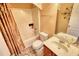 Traditional bathroom featuring a shower-tub combo, and patterned tile floor at 85 Tanglewood Dr, Covington, GA 30016