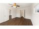 Bedroom with hardwood floors, window and access to a large closet at 1748 Marietta Nw Rd, Atlanta, GA 30318