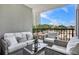 Inviting balcony featuring stylish seating and a glass table, perfect for relaxing outdoors with a beautiful view at 275 13Th St # Apt 509, Atlanta, GA 30309
