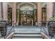 Grand building entrance featuring elegant stonework, glass doors, and a welcoming atmosphere at 275 13Th St # Apt 509, Atlanta, GA 30309