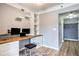 Modern home office featuring custom built-in desk, shelving, and minimalist design at 275 13Th St # Apt 509, Atlanta, GA 30309