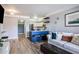 Cozy living room with comfortable seating, modern decor, and stylish furnishings near updated kitchen at 275 13Th St # Apt 509, Atlanta, GA 30309