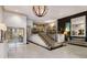 Elegant lobby area featuring a grand staircase, stylish decor, and a welcoming atmosphere at 275 13Th St # Apt 509, Atlanta, GA 30309