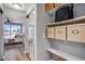 Walk-in closet with mirrored doors, shelving and storage for easy organization and access at 275 13Th St # Apt 509, Atlanta, GA 30309