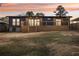 Backyard view of home featuring wooden deck and newly-constructed wooden fence at 3080 Hamilton Rd, Decatur, GA 30032