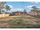 Large backyard featuring newly-constructed deck and wooden fence at 3080 Hamilton Rd, Decatur, GA 30032