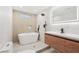 Luxurious bathroom with a soaking tub, a modern vanity, and a rain shower head at 3080 Hamilton Rd, Decatur, GA 30032