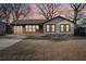 Charming single-story home with a long drive way at 3080 Hamilton Rd, Decatur, GA 30032