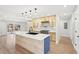 A spacious kitchen with modern cabinets and stainless steel appliances with a large kitchen island at 3080 Hamilton Rd, Decatur, GA 30032