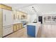 Bright kitchen features new cabinets, stainless appliances, and a large center island with a white countertop at 3080 Hamilton Rd, Decatur, GA 30032
