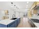 Kitchen with stainless appliances, new cabinetry and a sink in the center island at 3080 Hamilton Rd, Decatur, GA 30032