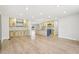 Bright, open kitchen with a large island, modern appliances, and hardwood floors at 3080 Hamilton Rd, Decatur, GA 30032