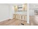 Cozy kitchenette featuring ample counter space, cabinets and modern hardwood floors at 3080 Hamilton Rd, Decatur, GA 30032