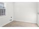 Laundry room with neutral paint, a window with blinds, and hookups for a washer and dryer at 3080 Hamilton Rd, Decatur, GA 30032