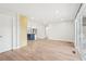 An open-concept living space flows seamlessly from indoors to outdoors with sliding glass doors to deck at 3080 Hamilton Rd, Decatur, GA 30032