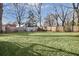 A spacious backyard with a well-maintained lawn and wooden fence at 1986 Memorial Se Dr, Atlanta, GA 30317