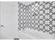 Bathroom featuring white tile and a large soaking tub at 1986 Memorial Se Dr, Atlanta, GA 30317