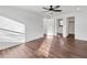 Bright bedroom with hardwood floors, walk in closet and white door at 1986 Memorial Se Dr, Atlanta, GA 30317