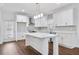 Well-lit kitchen featuring white cabinets, stainless steel appliances, and a center island perfect for entertaining at 1986 Memorial Se Dr, Atlanta, GA 30317