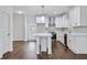 Bright kitchen with white cabinets, stainless steel appliances, and a functional center island at 1986 Memorial Se Dr, Atlanta, GA 30317
