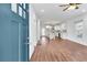 Inviting space with wood floors, flowing into an open kitchen featuring a white kitchen island at 1986 Memorial Se Dr, Atlanta, GA 30317