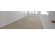 Bright bedroom featuring neutral carpet, white walls and window with view at 2329 Crestknoll Cir, Decatur, GA 30032