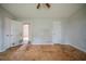 Bedroom featuring plywood flooring, a ceiling fan, and neutral walls at 3500 Quail Hollow Trl, Snellville, GA 30039