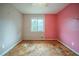 Bedroom featuring a window and weathered floors at 3500 Quail Hollow Trl, Snellville, GA 30039