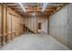 Unfinished basement with exposed framing and ductwork offering potential for customization at 4570 Thicket Trl, Snellville, GA 30039
