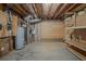 Unfinished basement with exposed ductwork, electrical and plumbing, offering customizable potential at 4570 Thicket Trl, Snellville, GA 30039