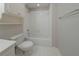 Functional bathroom includes a tiled shower/tub combination and a classic white vanity at 4570 Thicket Trl, Snellville, GA 30039