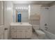 Bright bathroom features a shower/tub, white vanity, and toilet; perfect for everyday convenience at 4570 Thicket Trl, Snellville, GA 30039