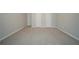 A large bedroom offers neutral carpet, light gray walls, and multiple closets at 4570 Thicket Trl, Snellville, GA 30039