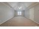 Bright bedroom with a trey ceiling, ceiling fan and a large window for natural light at 4570 Thicket Trl, Snellville, GA 30039