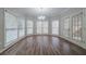 Breakfast area with a chandelier, large windows, and a door to the outside at 4570 Thicket Trl, Snellville, GA 30039