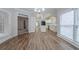 Open floor plan with view from dining room to kitchen with stainless steel appliances at 4570 Thicket Trl, Snellville, GA 30039