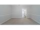 Dining room with carpet floors and view to the kitchen at 4570 Thicket Trl, Snellville, GA 30039