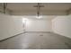 Spacious garage with neutral walls, offering ample room for parking and storage at 4570 Thicket Trl, Snellville, GA 30039